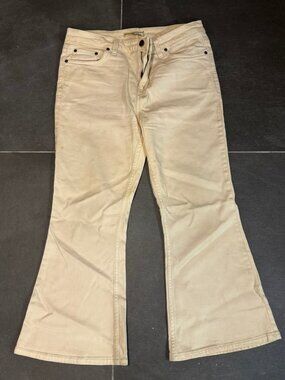 Cream Flare-Leg Jeans